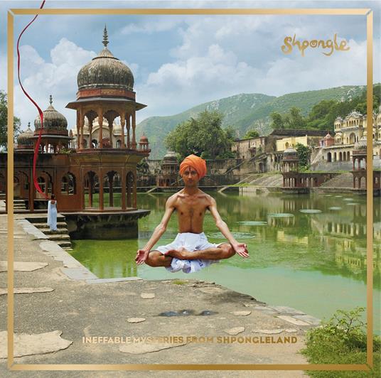 Ineffable Mysteries from Shpongleland album artwork: a man in an orange turban appears suspended above a lake, with stone pavilions and ripples behind him